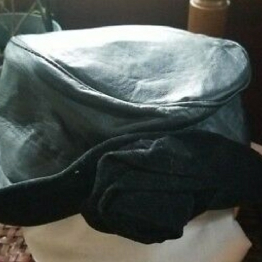 Ladies black leather hat with velvet trim